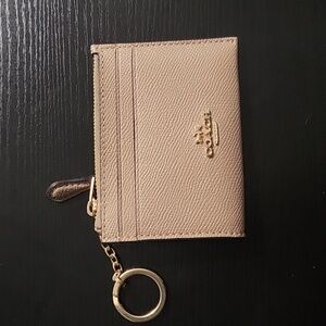 Beige Coach ID and coin wallet